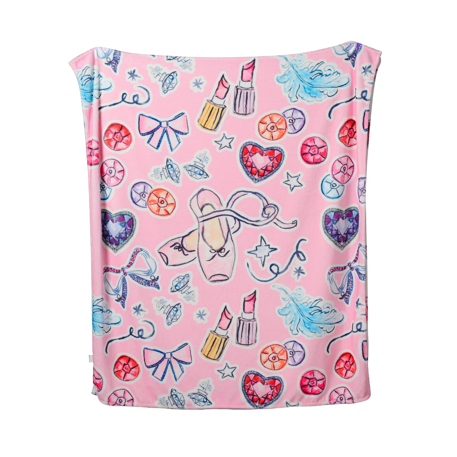 Pink blanket with colorful patterns including ballet shoes, bows, and hearts on a white background